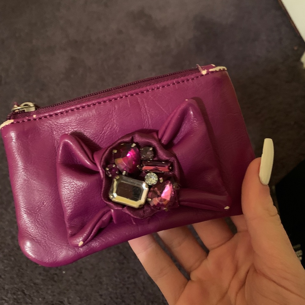 Purple wallet with sequence